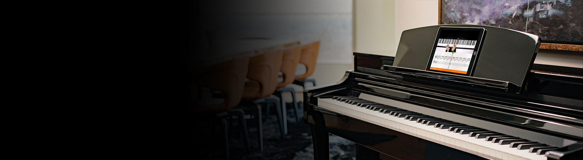 Digital piano with touchscreen interface on display, ideal for modern teaching and practice at Classic Pianos Seattle.