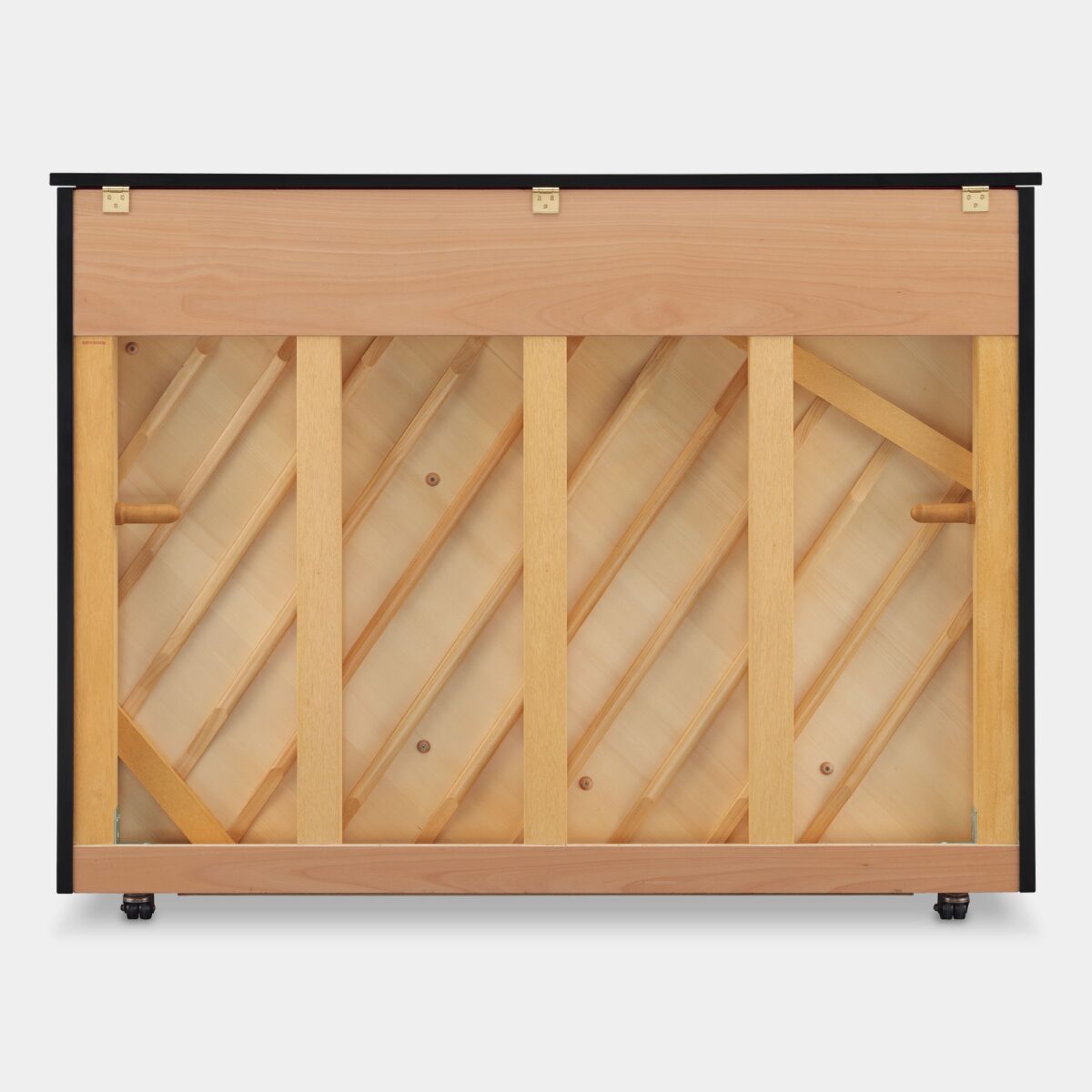 Yamaha acoustic piano back frame showcasing solid spruce support beams and craftsmanship details.