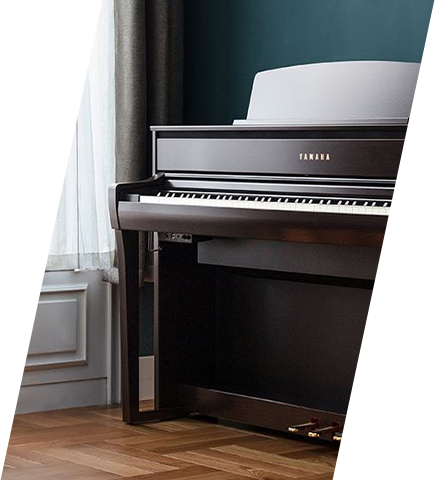Yamaha digital piano with sleek black finish in elegant home setting.